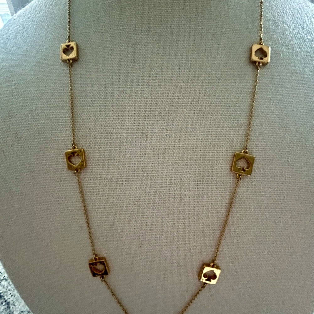 EUC Kate Spade Gold Plated Hole Punch Logo Necklace. 32”